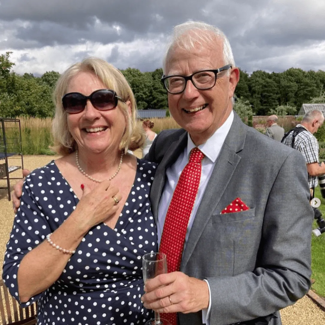 Judith Holder and her husband Michael dressed for a wedding.