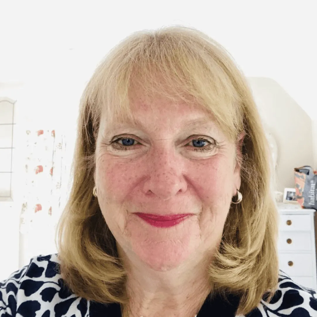 Judith Holder smiling, with a new haircut.